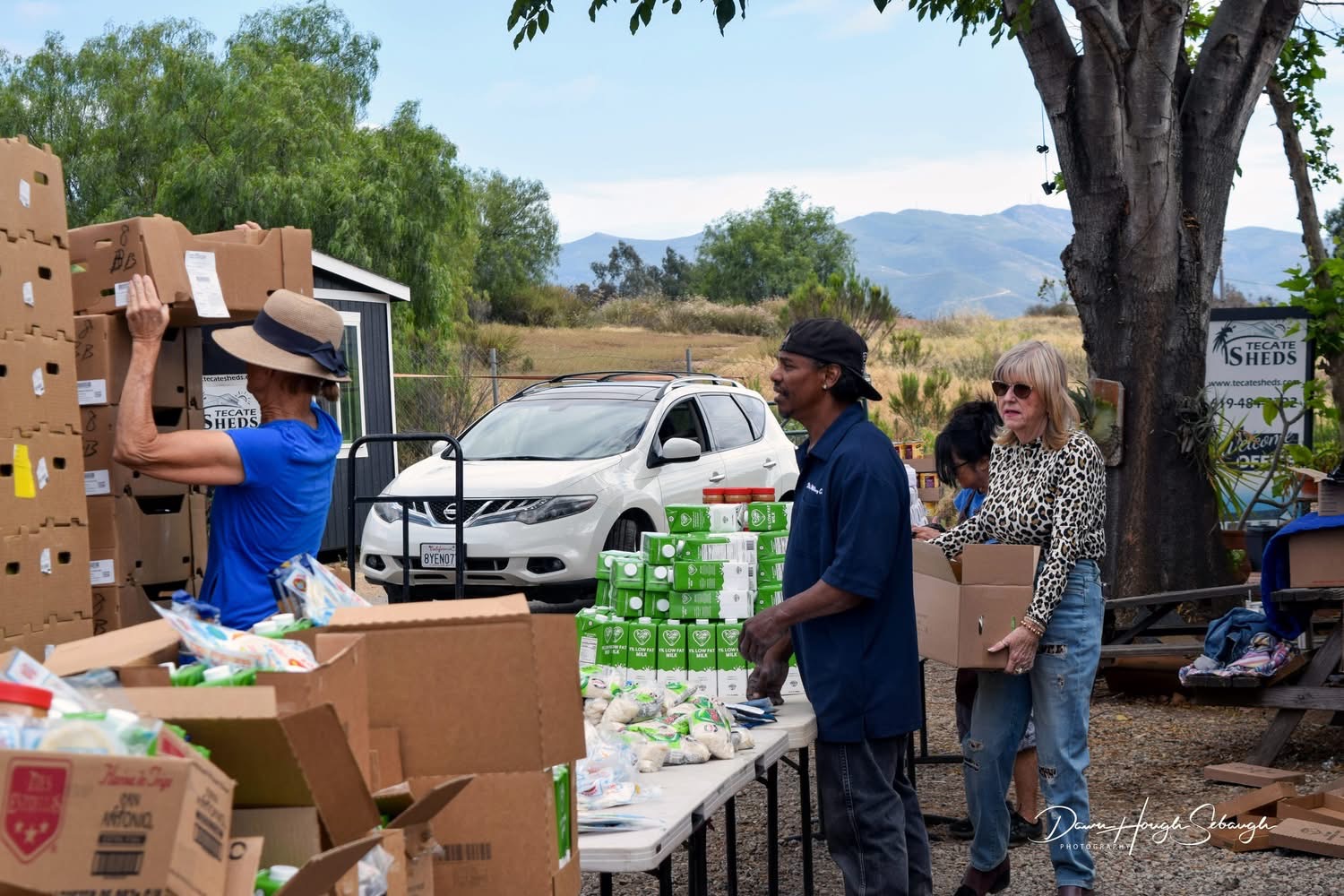 Volunteers working together during a distribution day