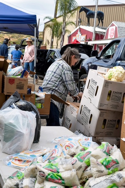 Volunteers and supporters helping power community food programs
